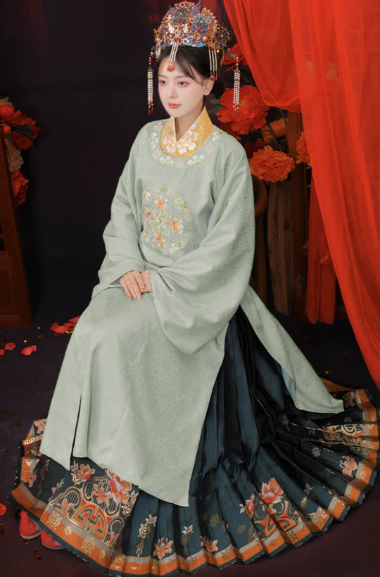 Step into the symphony of love with Harmony Zither Bridal, Ming. This exquisite gown pays homage to the Ming Dynasty&