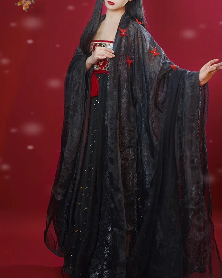 Embark on a journey of regal elegance with our Hezi Qun ensemble, Majestic Marceline. Revel in the harmonious blend of tradition and contemporary allure, stepping into a world of majestic beauty and cultural sophistication.