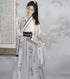 Experience the subtle allure of Whisper Modern Hanfu, a harmonious blend of tradition and modernity from Moon Hanfu&