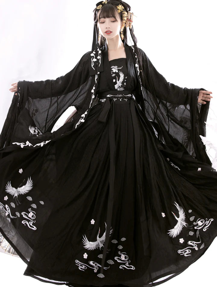 Experience the charm of the Tang Dynasty with our Qixiong Ruqun ensemble inspired by Yang Guifei, embodying a unique chapter in feminine ideals. Step into timeless elegance with this regal "Da Xiu Shan" coat, capturing historical trends with a contemporary twist.