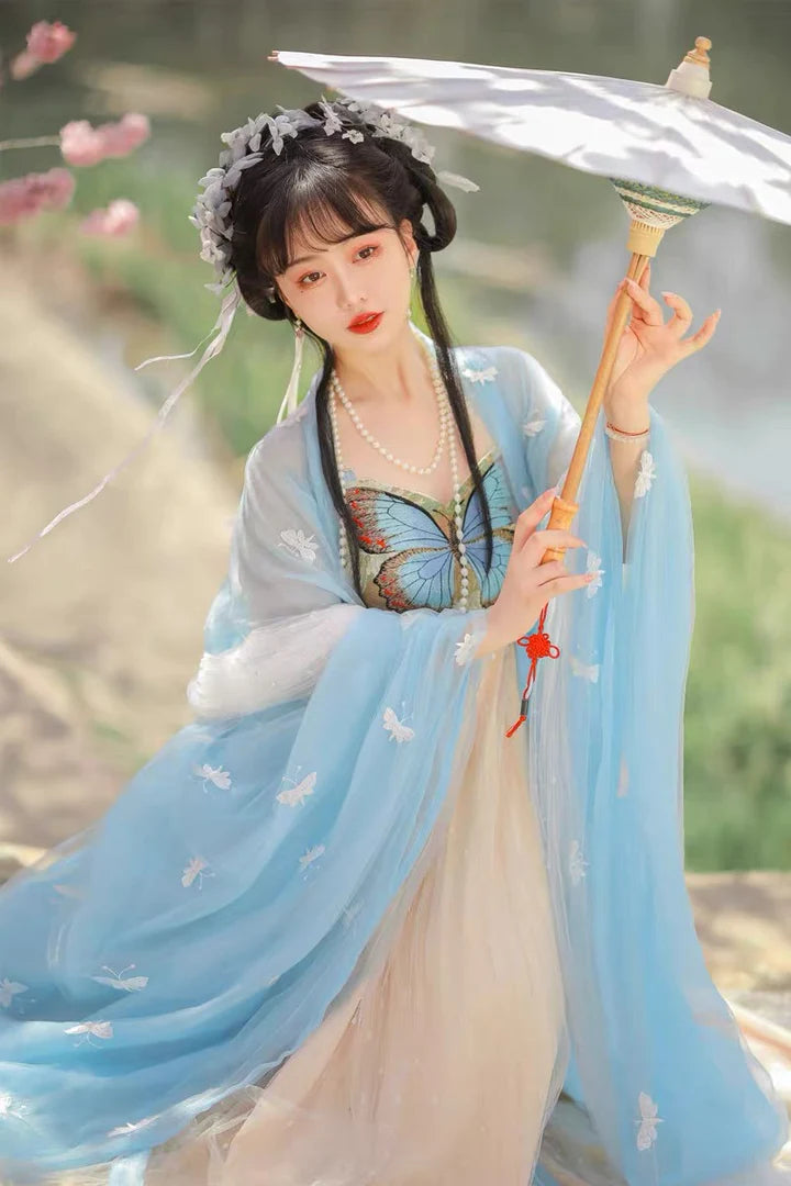 Immerse yourself in the allure of the Hezi Qun, beautifully captured in the Captivating Kiera ensemble. This captivating attire seamlessly blends tradition with a touch of contemporary charm. Step into the enchanting allure of this outfit, embodying a captivating and timeless style that adds a touch of intrigue to your wardrobe.