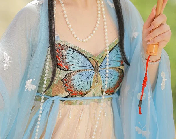 Immerse yourself in the allure of the Hezi Qun, beautifully captured in the Captivating Kiera ensemble. This captivating attire seamlessly blends tradition with a touch of contemporary charm. Step into the enchanting allure of this outfit, embodying a captivating and timeless style that adds a touch of intrigue to your wardrobe.