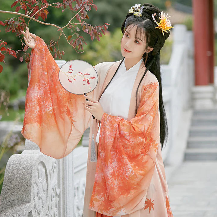Step into the allure of Summerline Jiaoling Ruqun, a captivating blend of tradition and contemporary allure inspired by the Wei Jin Dynasty. Immerse yourself in the distinctive style of cross-collared and wide-sleeved garments, echoing the iconic Jin Ru 晋襦 and Za Ju 杂裾 fashion trends. Explore and express your unique style with the enchanting Summerline, exclusively available in our Wei Jin Dynasty-inspired pieces at Moon Hanfu.
