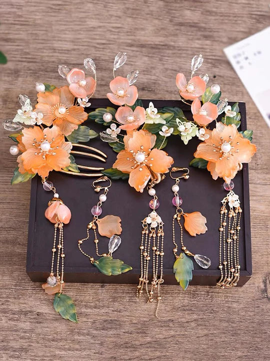 Elaborate hair comb with decorative motifs, adding a touch of elegance to the hairstyle.