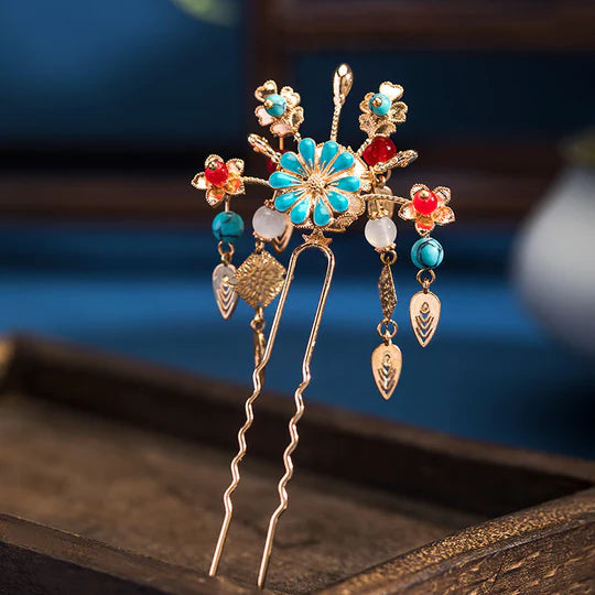 Discover the beauty and versatility of the Chinese Hairpin Set Collection. This curated collection features a variety of traditional Chinese hairpins, each exquisitely designed with intricate details and cultural significance. From floral-inspired designs to ornate motifs, this collection offers a range of options to complement your Hanfu ensemble or add a touch of elegance to any hairstyle.