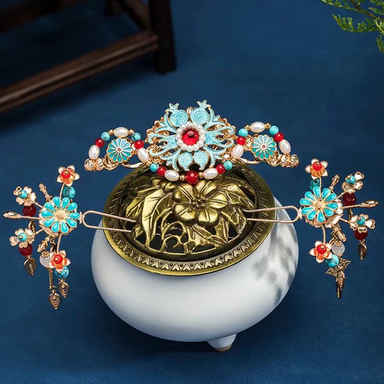 Discover the beauty and versatility of the Chinese Hairpin Set Collection. This curated collection features a variety of traditional Chinese hairpins, each exquisitely designed with intricate details and cultural significance. From floral-inspired designs to ornate motifs, this collection offers a range of options to complement your Hanfu ensemble or add a touch of elegance to any hairstyle.