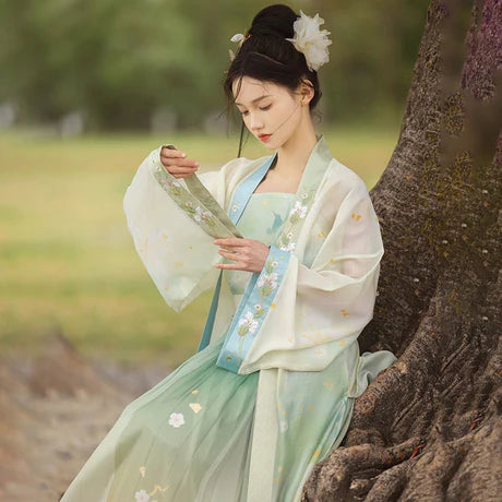 **Alt Text for Image:** "Enchanting Fern Qiyao Ruqun Ensemble - Song Dynasty Style. A fusion of historical charm and contemporary elegance, perfect for themed events or infusing sophistication into your wardrobe."