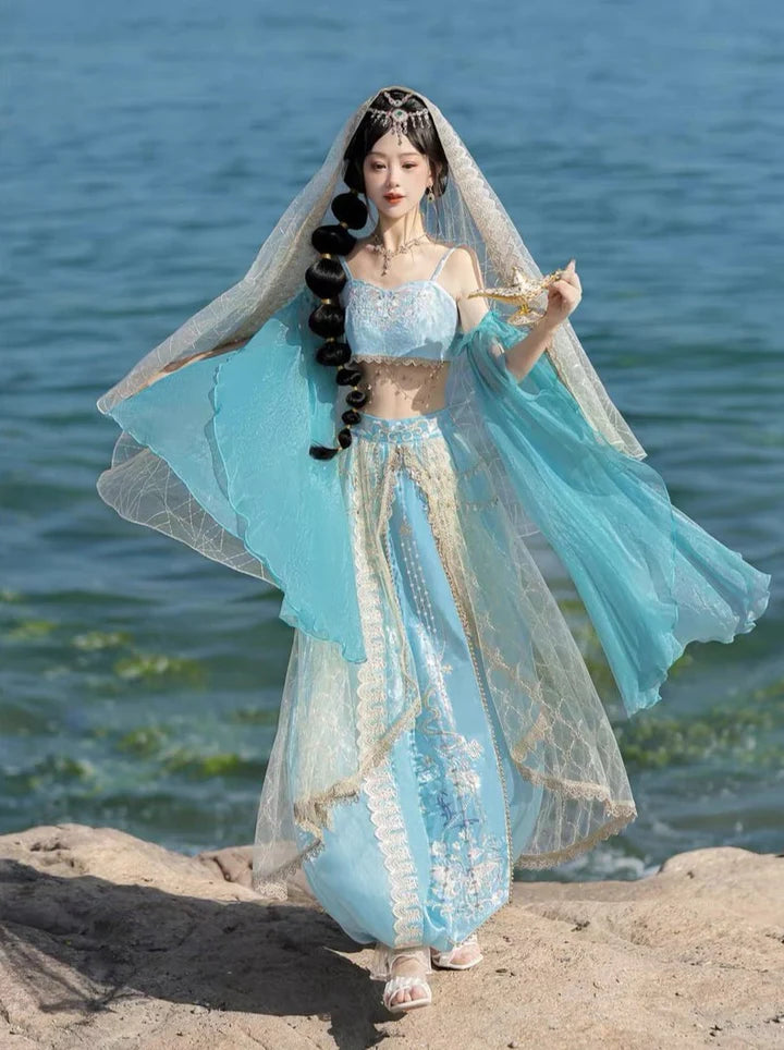 Dive into the timeless elegance of Sealine Dunhuang Hanfu, a mesmerizing fusion of Central Asian, Tibetan, Indian, and Chinese influences exclusively curated by Moon Hanfu. Originating from the northwest Chinese region along the Silk Road, this traditional attire from our Dunhuang Collection reflects the diverse cultural interactions of the area. Embrace a palette of vibrant colors that illustrate the artistic aesthetics and beliefs, connecting you to a rich tapestry of history.