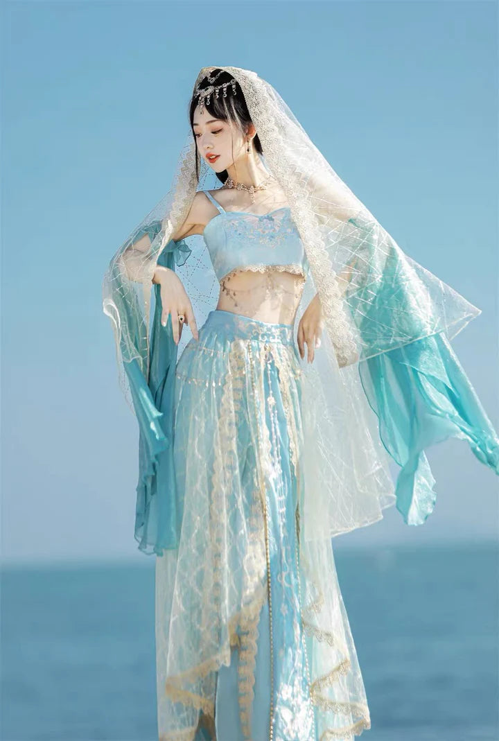 Dive into the timeless elegance of Sealine Dunhuang Hanfu, a mesmerizing fusion of Central Asian, Tibetan, Indian, and Chinese influences exclusively curated by Moon Hanfu. Originating from the northwest Chinese region along the Silk Road, this traditional attire from our Dunhuang Collection reflects the diverse cultural interactions of the area. Embrace a palette of vibrant colors that illustrate the artistic aesthetics and beliefs, connecting you to a rich tapestry of history.