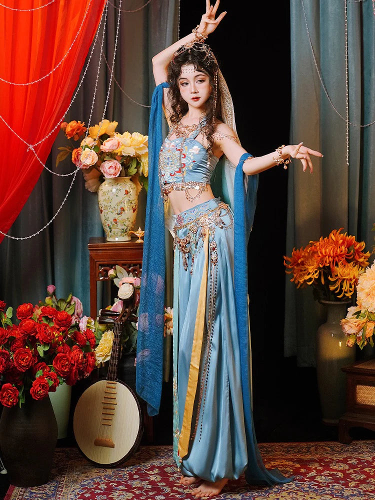 Immerse yourself in the enchanting allure of Fairy Dunhuang Hanfu, a magical fusion of Central Asian, Tibetan, Indian, and Chinese influences exclusively curated by Moon Hanfu. Originating from the northwest Chinese region along the Silk Road, this ethereal attire from our Dunhuang Collection reflects the diverse cultural interactions of the area. Embrace a palette of vibrant colors that weave a story of artistic aesthetics and beliefs, connecting you to a rich tapestry of history.