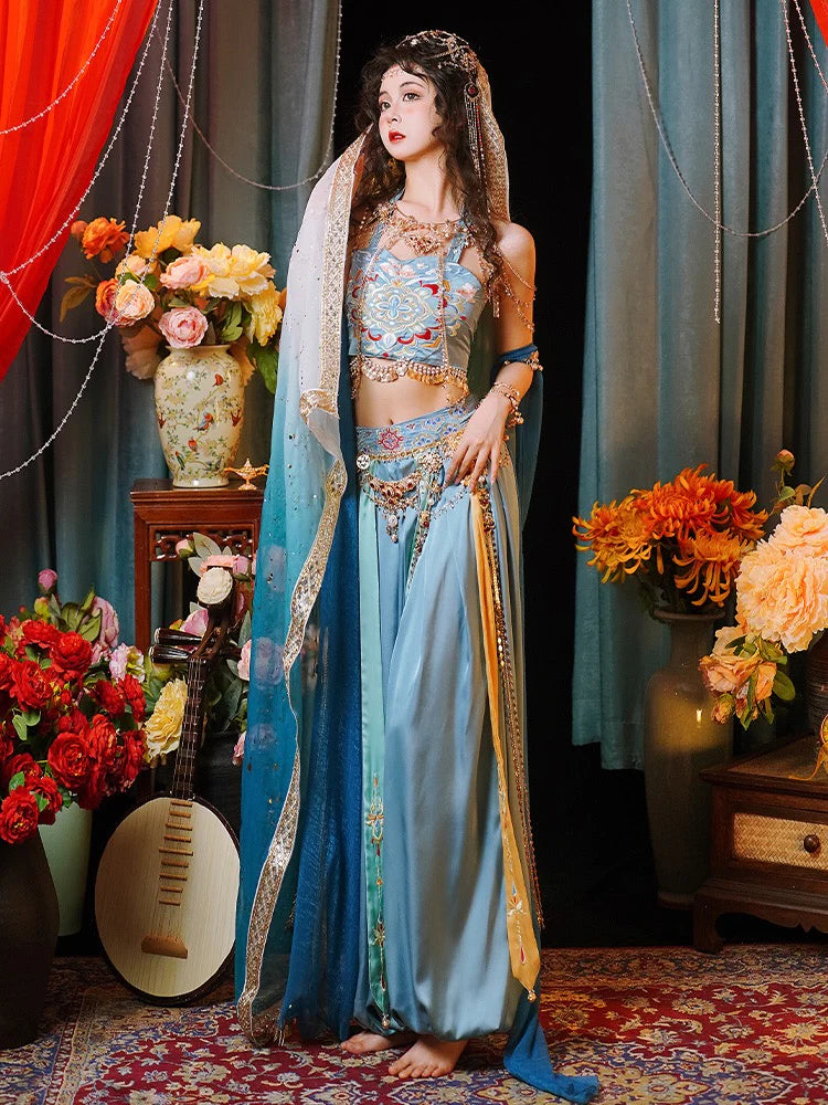 Immerse yourself in the enchanting allure of Fairy Dunhuang Hanfu, a magical fusion of Central Asian, Tibetan, Indian, and Chinese influences exclusively curated by Moon Hanfu. Originating from the northwest Chinese region along the Silk Road, this ethereal attire from our Dunhuang Collection reflects the diverse cultural interactions of the area. Embrace a palette of vibrant colors that weave a story of artistic aesthetics and beliefs, connecting you to a rich tapestry of history.