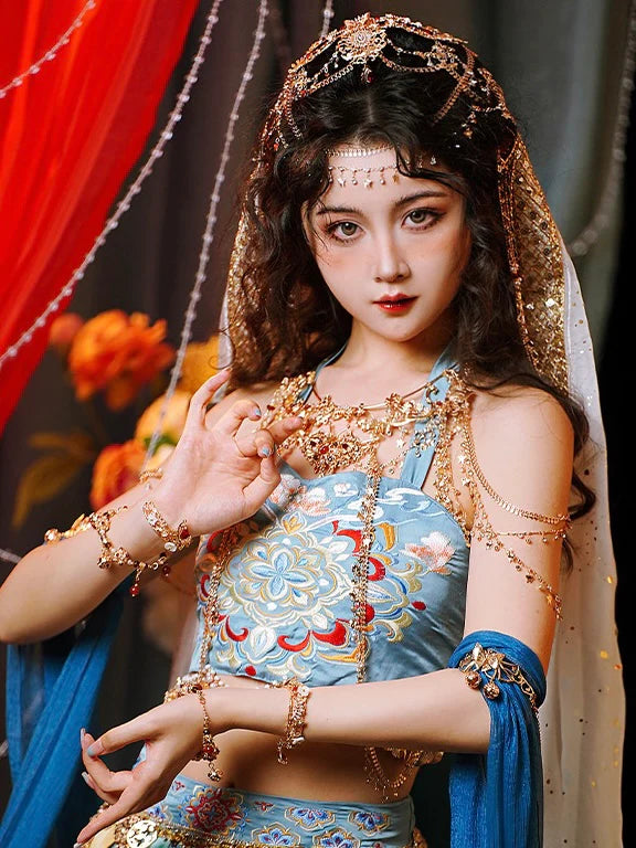 Immerse yourself in the enchanting allure of Fairy Dunhuang Hanfu, a magical fusion of Central Asian, Tibetan, Indian, and Chinese influences exclusively curated by Moon Hanfu. Originating from the northwest Chinese region along the Silk Road, this ethereal attire from our Dunhuang Collection reflects the diverse cultural interactions of the area. Embrace a palette of vibrant colors that weave a story of artistic aesthetics and beliefs, connecting you to a rich tapestry of history.