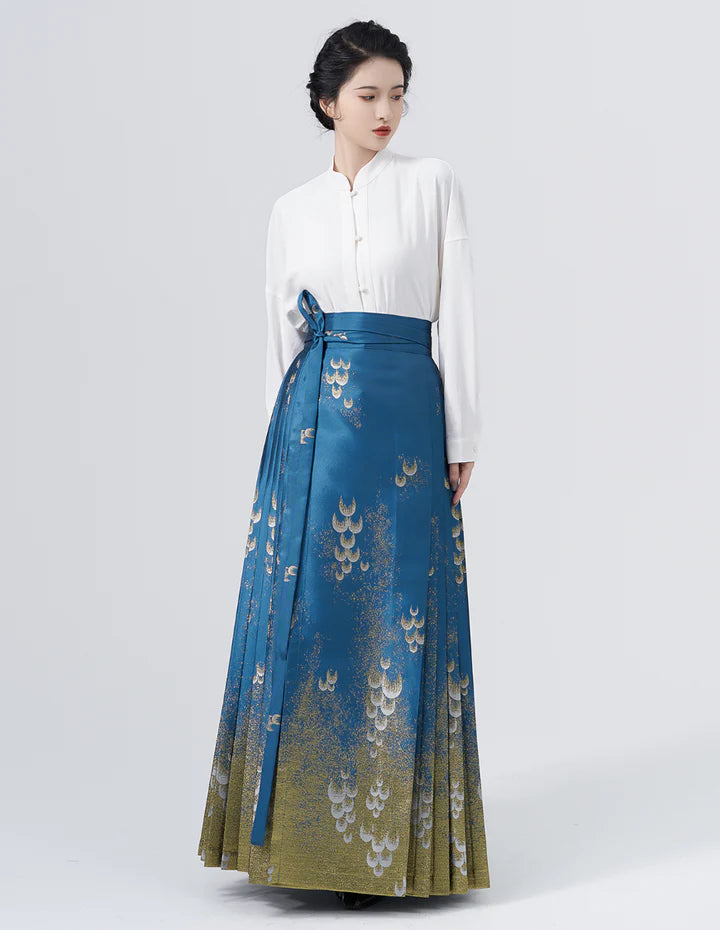 Elevate your style with the Blue Dream Elegance Modern Hanfu Ensemble, a harmonious blend of modern sophistication and timeless beauty. Immerse yourself in the allure of our Modern Hanfu collection, seamlessly capturing the essence of tradition with a contemporary touch. Discover the sophistication and grace of traditional Chinese fashion with the Blue Dream Elegance