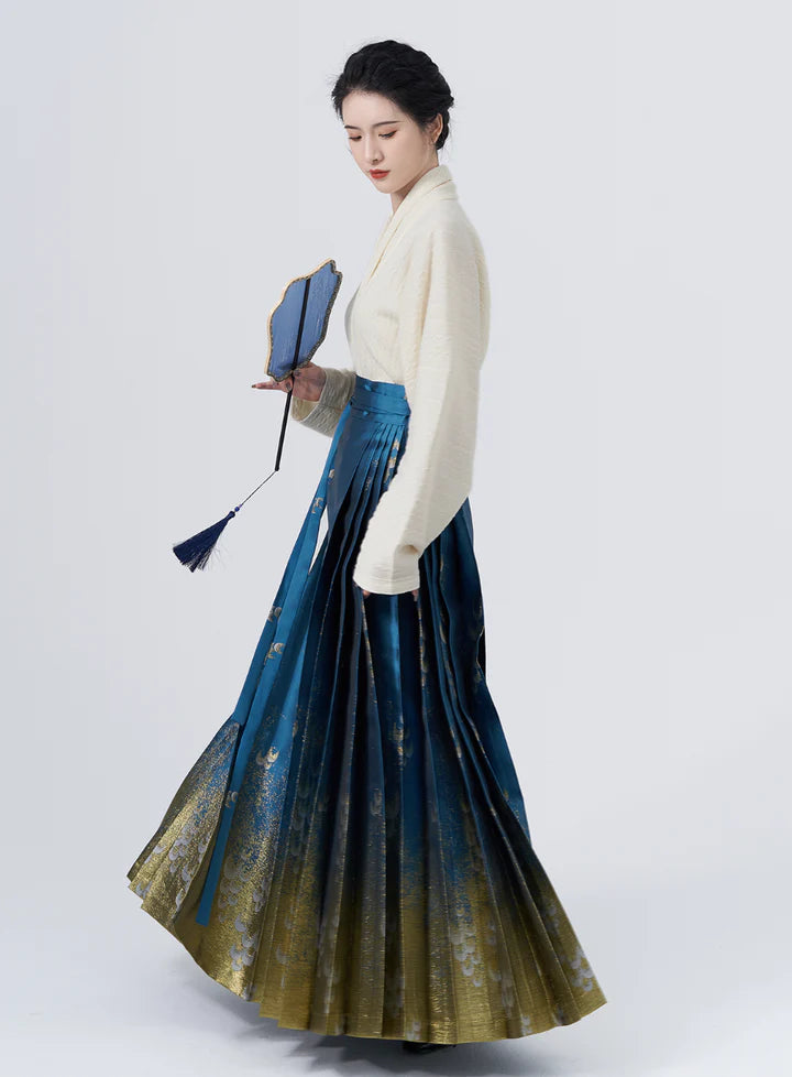 Elevate your style with the Blue Dream Elegance Modern Hanfu Ensemble, a harmonious blend of modern sophistication and timeless beauty. Immerse yourself in the allure of our Modern Hanfu collection, seamlessly capturing the essence of tradition with a contemporary touch. Discover the sophistication and grace of traditional Chinese fashion with the Blue Dream Elegance