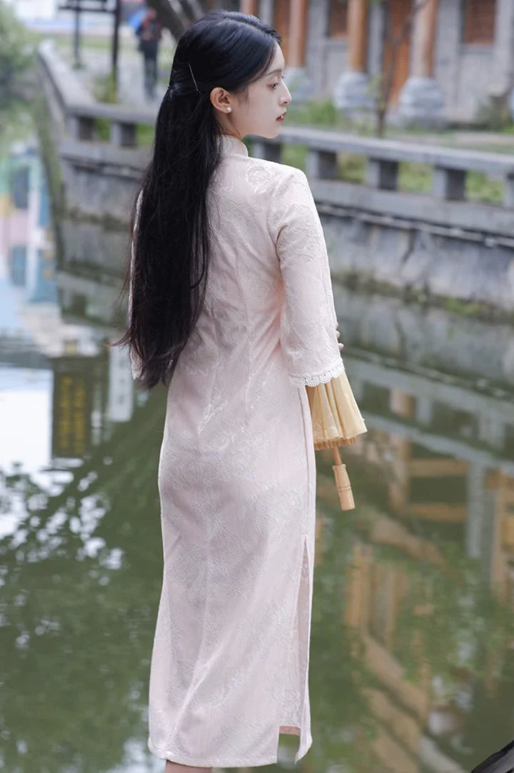 Immerse yourself in the opulent elegance of Opulent Wide Sleeve Qipao in Goldmine—a perfect blend of tradition, femininity, and style from Moon Hanfu&