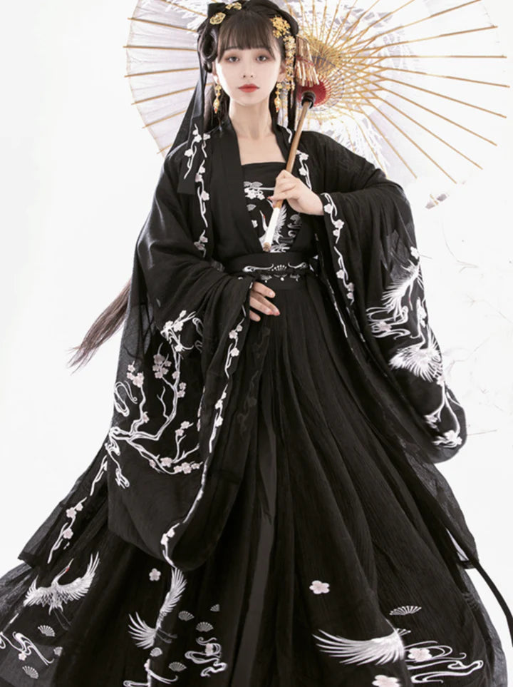 Experience the charm of the Tang Dynasty with our Qixiong Ruqun ensemble inspired by Yang Guifei, embodying a unique chapter in feminine ideals. Step into timeless elegance with this regal &quot;Da Xiu Shan&quot; coat, capturing historical trends with a contemporary twist.