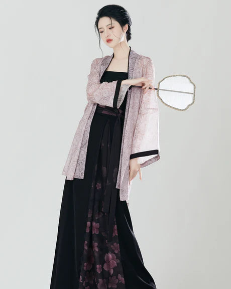 Sophisticated Saira Modern Hanfu Ensemble - Timeless Elegance Revived. Illuminate your style with Saira, a radiant fusion of modern sophistication and ancient charm. Immerse yourself in the revived elegance of our Modern Hanfu collection, capturing the essence of tradition with a contemporary touch.