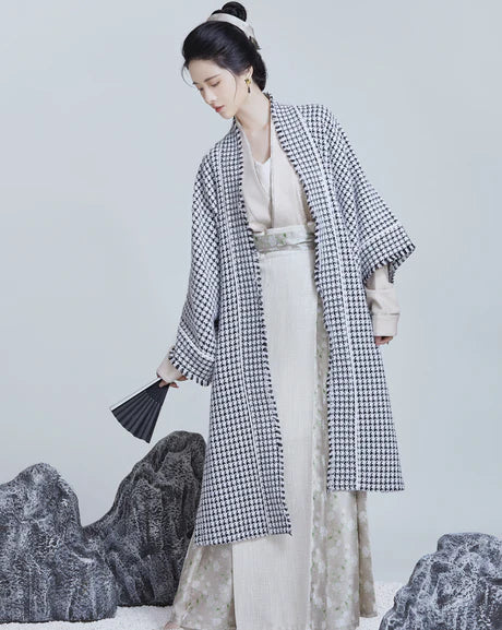 Grace Modern Hanfu Ensemble - Timeless Elegance Revived. Embark on a journey of elegance with Paige, a modern interpretation of traditional beauty. Our Modern Hanfu collection invites you to embrace the allure of the past with a contemporary touch, creating a harmonious blend of sophistication and tradition.