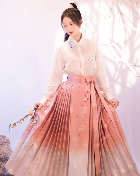 Elevate your style with the Blossom Bliss Mamian Skirt, a perfect fusion of elegance and charm. Embrace the floral beauty and add a touch of grace to your wardrobe