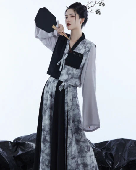 Majestic Marissa Modern Hanfu Ensemble - Timeless Elegance Revived. Embrace the allure of tradition with Marissa, a modern interpretation of timeless beauty. Our Modern Hanfu collection invites you to experience the grace of the past with a contemporary touch, creating a harmonious blend of sophistication and tradition.