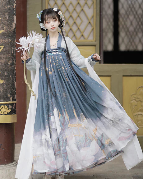 Experience the timeless elegance of our Tang Dynasty-inspired Qixiong Ruqun ensemble, Angelic Ash. Step into history with this regal attire, capturing the allure of the past while embracing contemporary grace.