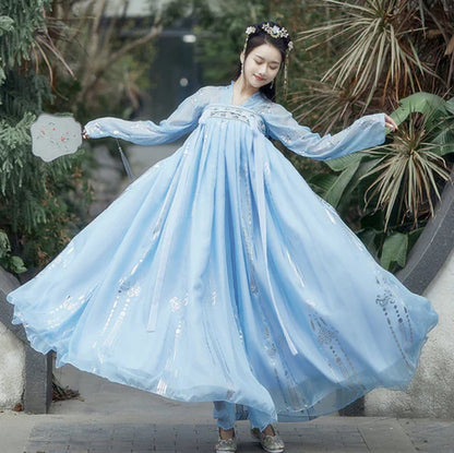 Step into the elegance of Tang Dynasty with Vivacious Blaire, a two or three-piece ensemble inspired by the Qixiong Ruqun. Embrace the regal &quot;Da Xiu Shan&quot; coat, capturing the historical trend with a blend of tradition and contemporary elegance. Experience timeless influence as you step out in style, paying homage to centuries past.