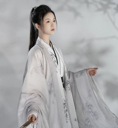 Experience the subtle allure of Whisper Modern Hanfu, a harmonious blend of tradition and modernity from Moon Hanfu&