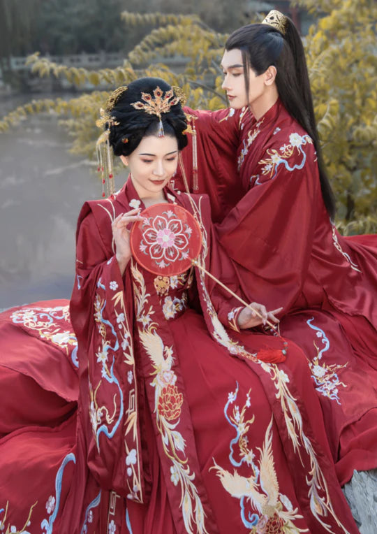 Immerse yourself in the melody of tradition with Serenique Groom, Song—an ensemble that echoes the grace and cultural richness of the Song Dynasty. Elevate your wedding day with a harmonious blend of sophistication and historical allure, making a statement that resonates through time.