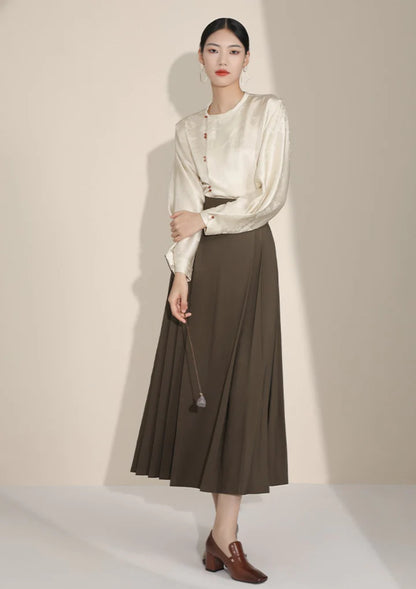 Elevate your style with the Brown Elegance Modern Hanfu Ensemble, a harmonious blend of modern sophistication and timeless beauty. Immerse yourself in the allure of our Modern Hanfu collection, seamlessly capturing the essence of tradition with a contemporary touch. Discover the sophistication and grace of traditional Chinese fashion with the Brown Elegance.