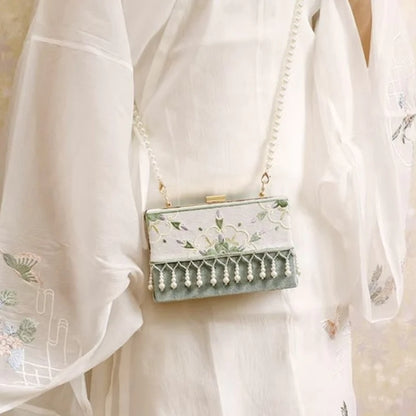 Elevate your style with the Petal Perfection Floral Clutch. Explore our curated collection at Moon Accessories for a fashionable and versatile accessory adorned with delightful floral patterns, adding a touch of natural beauty to your ensemble.