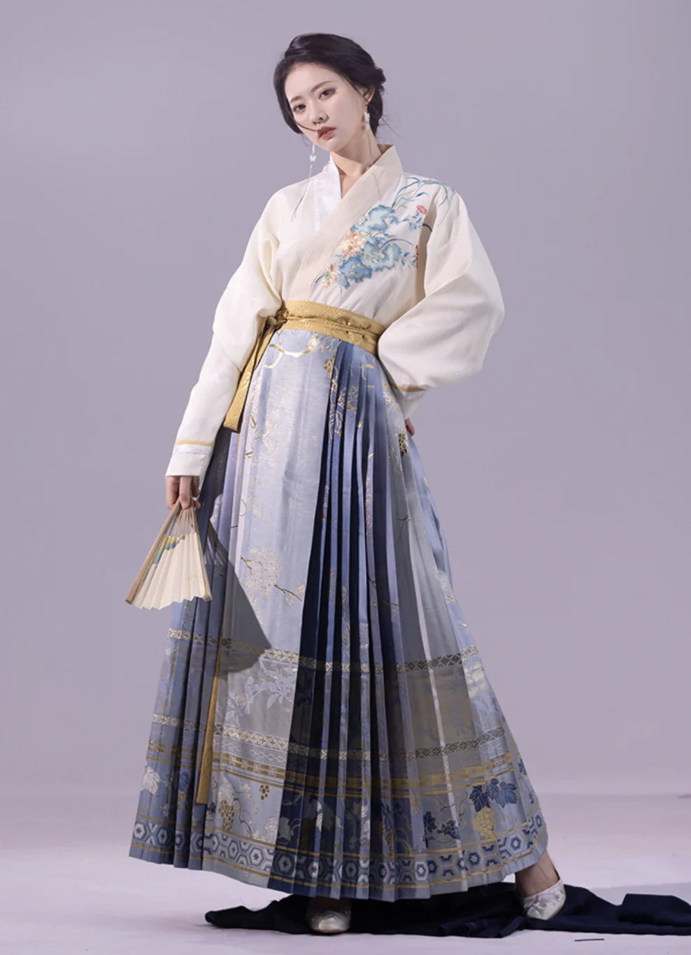 Elevate your style with the Enchanting Whimsy Modern Hanfu Ensemble, a harmonious blend of modern sophistication and timeless beauty. Immerse yourself in the allure of our Modern Hanfu collection, seamlessly capturing the essence of tradition with a contemporary touch. Discover the sophistication and grace of traditional Chinese fashion with the Enchanting Whimsy.