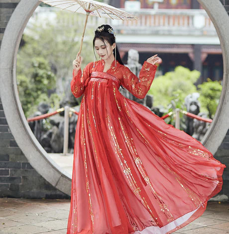 Step into the elegance of Tang Dynasty with Vivacious Blaire, a two or three-piece ensemble inspired by the Qixiong Ruqun. Embrace the regal &quot;Da Xiu Shan&quot; coat, capturing the historical trend with a blend of tradition and contemporary elegance. Experience timeless influence as you step out in style, paying homage to centuries past.