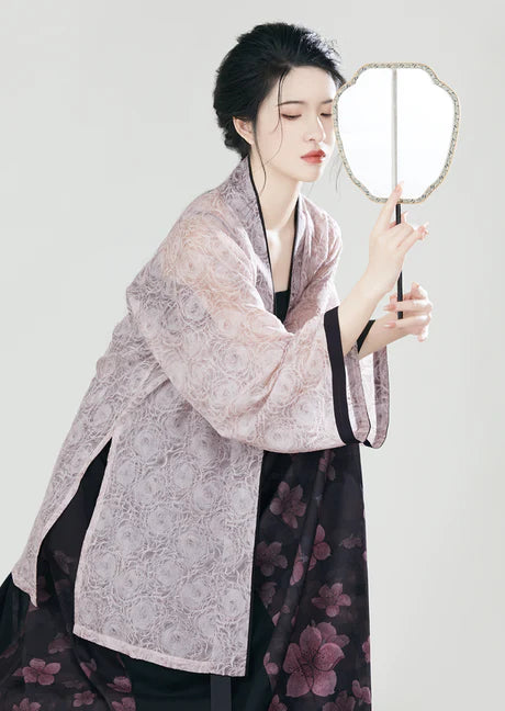 Sophisticated Saira Modern Hanfu Ensemble - Timeless Elegance Revived. Illuminate your style with Saira, a radiant fusion of modern sophistication and ancient charm. Immerse yourself in the revived elegance of our Modern Hanfu collection, capturing the essence of tradition with a contemporary touch.