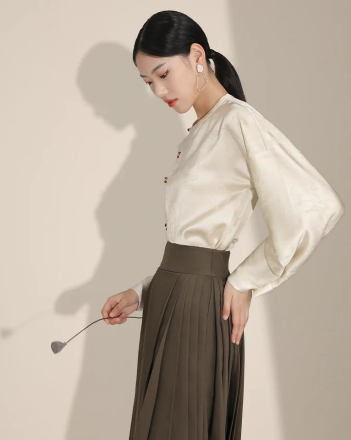 Elevate your style with the Brown Elegance Modern Hanfu Ensemble, a harmonious blend of modern sophistication and timeless beauty. Immerse yourself in the allure of our Modern Hanfu collection, seamlessly capturing the essence of tradition with a contemporary touch. Discover the sophistication and grace of traditional Chinese fashion with the Brown Elegance.