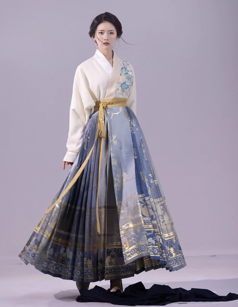 Elevate your style with the Enchanting Whimsy Modern Hanfu Ensemble, a harmonious blend of modern sophistication and timeless beauty. Immerse yourself in the allure of our Modern Hanfu collection, seamlessly capturing the essence of tradition with a contemporary touch. Discover the sophistication and grace of traditional Chinese fashion with the Enchanting Whimsy.