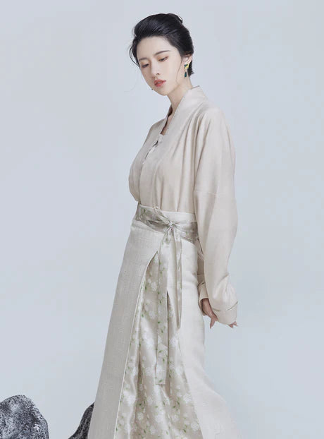 Grace Modern Hanfu Ensemble - Timeless Elegance Revived. Embark on a journey of elegance with Paige, a modern interpretation of traditional beauty. Our Modern Hanfu collection invites you to embrace the allure of the past with a contemporary touch, creating a harmonious blend of sophistication and tradition.