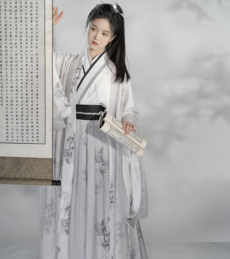 Experience the subtle allure of Whisper Modern Hanfu, a harmonious blend of tradition and modernity from Moon Hanfu&