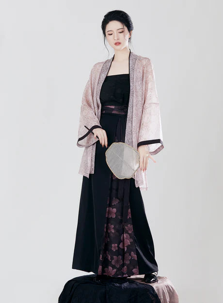 Sophisticated Saira Modern Hanfu Ensemble - Timeless Elegance Revived. Illuminate your style with Saira, a radiant fusion of modern sophistication and ancient charm. Immerse yourself in the revived elegance of our Modern Hanfu collection, capturing the essence of tradition with a contemporary touch.