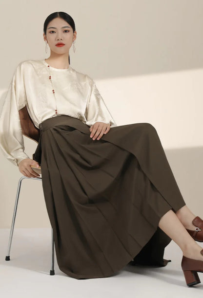 Elevate your style with the Brown Elegance Modern Hanfu Ensemble, a harmonious blend of modern sophistication and timeless beauty. Immerse yourself in the allure of our Modern Hanfu collection, seamlessly capturing the essence of tradition with a contemporary touch. Discover the sophistication and grace of traditional Chinese fashion with the Brown Elegance.