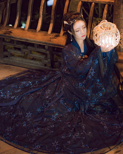 Unveil celestial elegance with our Qixiong Ruqun ensemble, Stellar Raven. Experience the fusion of tradition and modern allure, as you step into a world of stellar beauty and cultural sophistication.