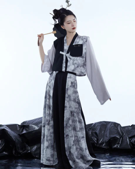 Majestic Marissa Modern Hanfu Ensemble - Timeless Elegance Revived. Embrace the allure of tradition with Marissa, a modern interpretation of timeless beauty. Our Modern Hanfu collection invites you to experience the grace of the past with a contemporary touch, creating a harmonious blend of sophistication and tradition