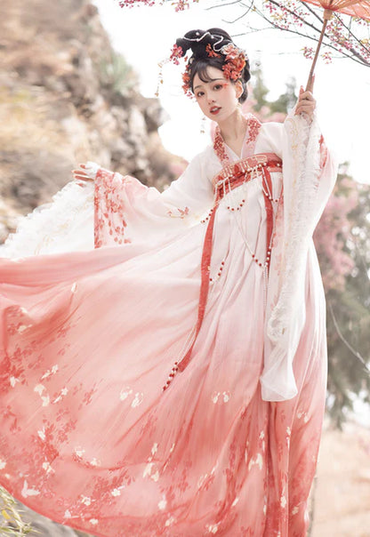 Experience the allure of the Qixiong Ruqun in the Charming Sakura ensemble. This captivating attire seamlessly blends tradition with a touch of contemporary charm. Immerse yourself in the graceful beauty of this outfit, embodying a charming and timeless style inspired by the delicate blossoms of Sakura, adding a touch of floral elegance to your wardrobe.