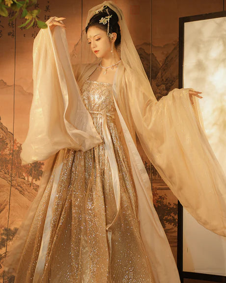 Indulge in the grandeur of our Hezi Qun ensemble, Colossal Ivory. Experience the magnificent fusion of tradition and contemporary style, as you step into a world of colossal beauty and cultural sophistication.