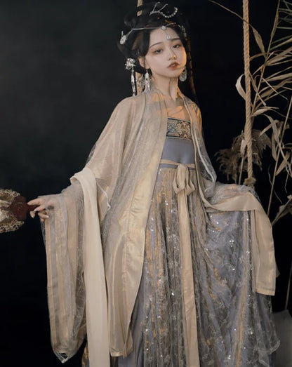 Immerse yourself in enchanting elegance with our Hezi Qun ensemble, Mystical Mina. Experience the magical fusion of tradition and contemporary allure, as you step into a world of mystical beauty and cultural refinement.