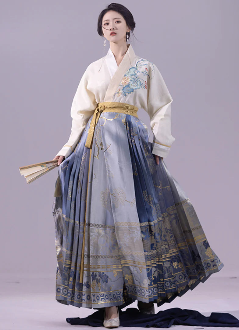 Elevate your style with the Enchanting Whimsy Modern Hanfu Ensemble, a harmonious blend of modern sophistication and timeless beauty. Immerse yourself in the allure of our Modern Hanfu collection, seamlessly capturing the essence of tradition with a contemporary touch. Discover the sophistication and grace of traditional Chinese fashion with the Enchanting Whimsy.