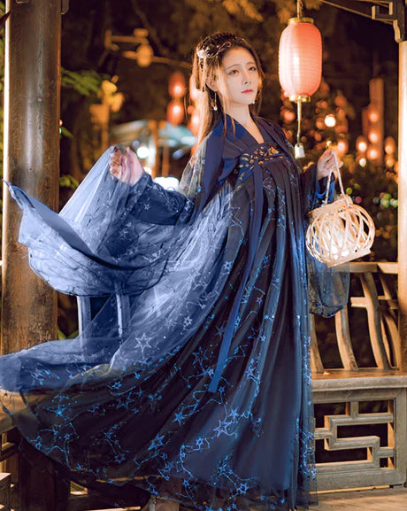 Unveil celestial elegance with our Qixiong Ruqun ensemble, Stellar Raven. Experience the fusion of tradition and modern allure, as you step into a world of stellar beauty and cultural sophistication.