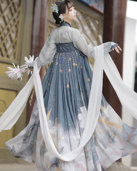 Experience the timeless elegance of our Tang Dynasty-inspired Qixiong Ruqun ensemble, Angelic Ash. Step into history with this regal attire, capturing the allure of the past while embracing contemporary grace.