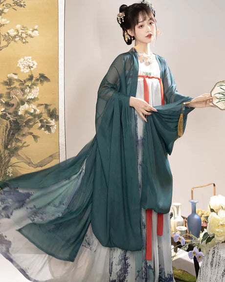 Immerse yourself in elegance with the Qixiong Ruqun, beautifully captured in the Graceful Gwen ensemble. This captivating attire effortlessly merges tradition with contemporary charm. Step into the sophisticated allure of this outfit, embodying a graceful and timeless style that adds a touch of refinement to your wardrobe.