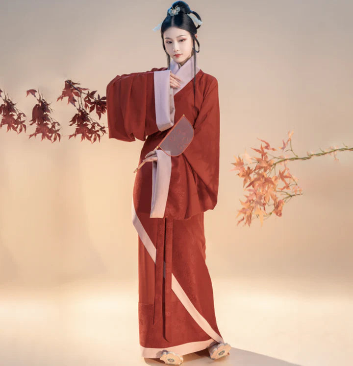 Immerse yourself in the timeless allure of Qu Ju Shenyi or Qu Ju Pao from Moon Hanfu&