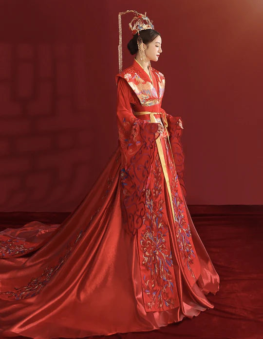 Step into regal splendor with &quot;The Queen&quot; gown—an embodiment of grace, power, and timeless elegance. Illuminate your presence with this majestic ensemble, making a royal statement that captures the essence of regality. Reign over your special day in &quot;The Queen,&quot; where every detail is crafted for a majestic celebration of love and sophistication.